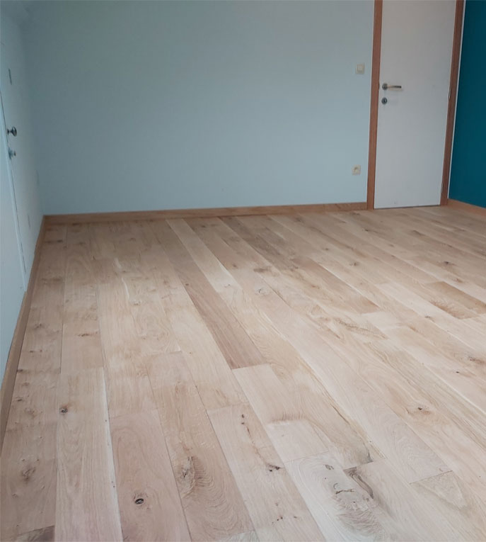 Pose de parquet à Ath